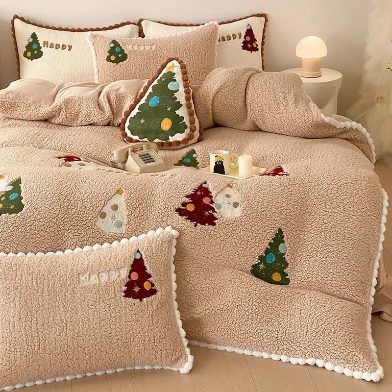 Bright yellow fleece-lined bedding set with cartoon Christmas trees, showing quilt cover and pillowcases.