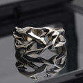 Copper thorn ring with geometric flower design and adjustable opening
