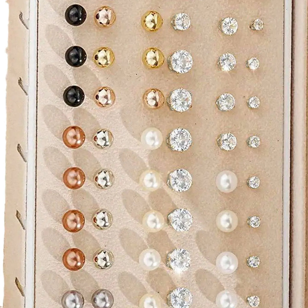 108 gold and yellow geometric round pearl earrings spread out, showing electroplated alloy construction.
