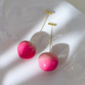Acrylic peach fruit earrings with copper fittings in small and large size options