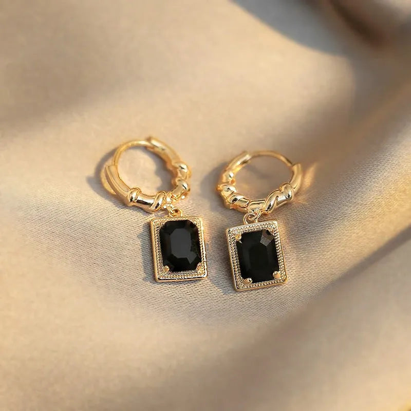 Geometric quadrilateral copper earrings with black zircon detail in French court retro style