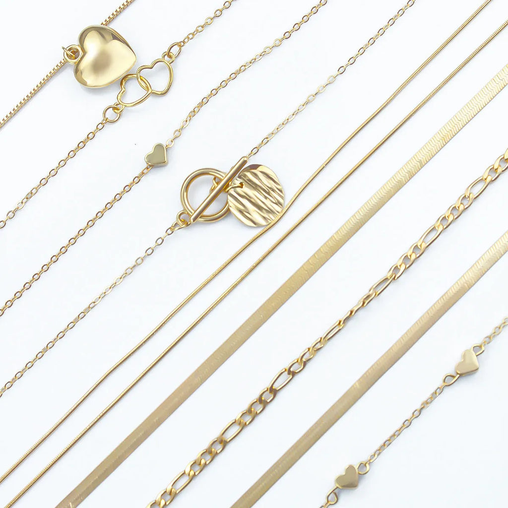 Women's gold necklace set with 10 alloy pendants on adjustable snake bone chain