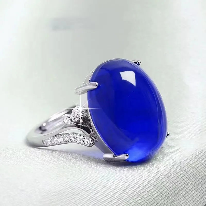 Adjustable alloy ring with geometric ethnic design and natural sapphire stone in five colours.