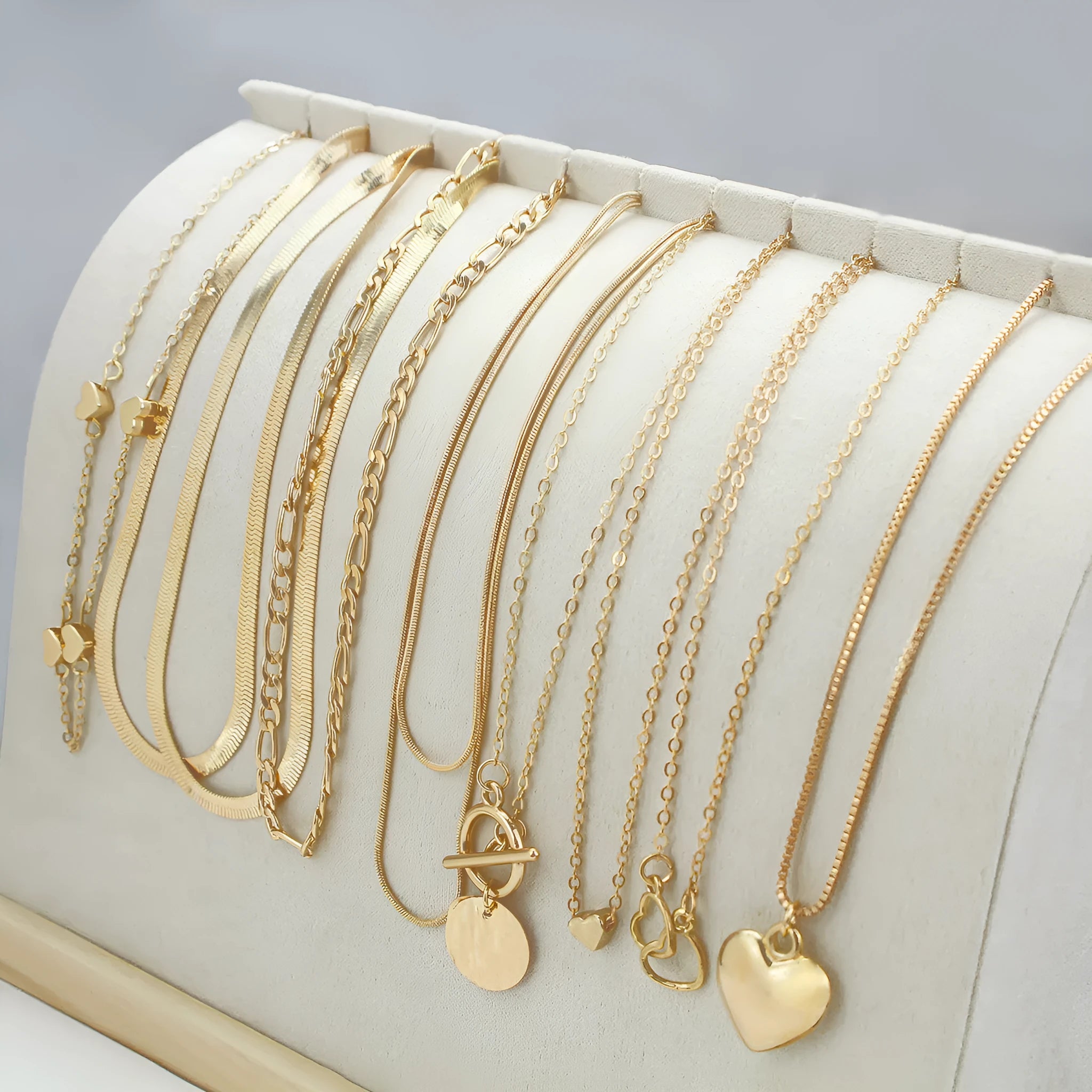 Women's gold necklace set with 10 alloy pendants on adjustable snake bone chain