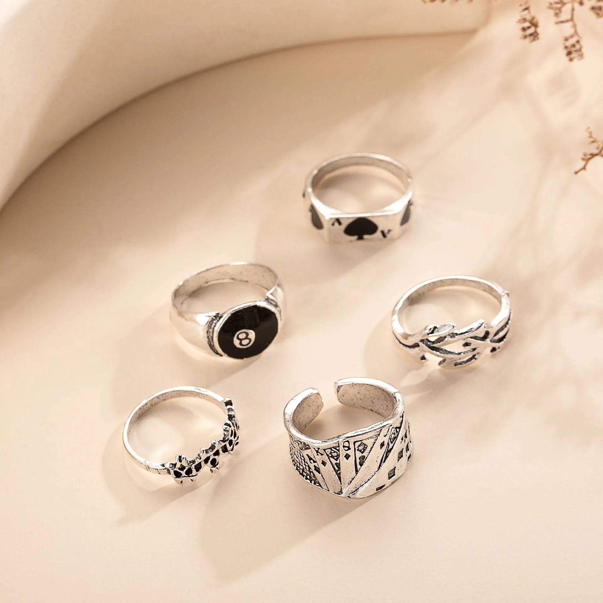 Black alloy poker ring with raised spade card design on band