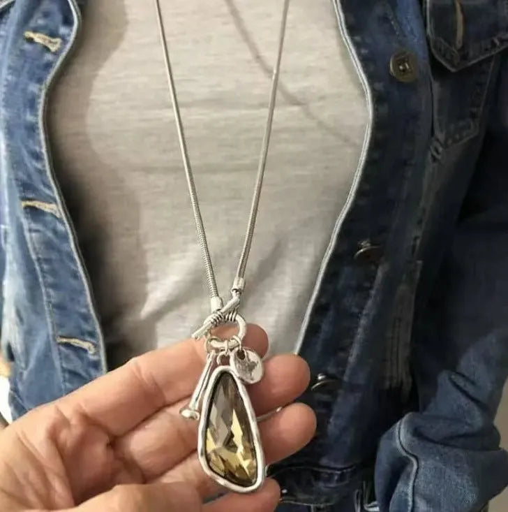 Geometric alloy pendant on long snake bones chain necklace in blue, champagne, or grey colour