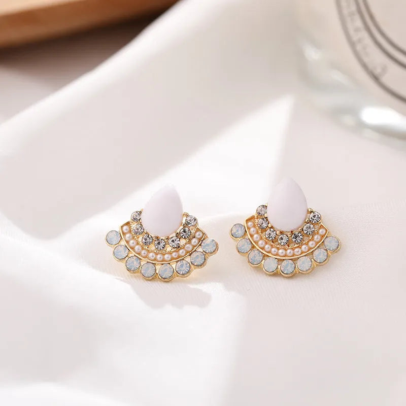 Women's retro fan-shaped needle earrings with sterling silver electroplating and rhinestone accents