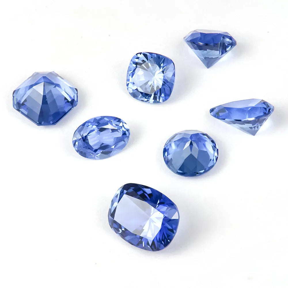Royal blue love heart tiara shaped gemstones showing round, heart, pear, Asche, egg, fat square, and fat rectangular cuts