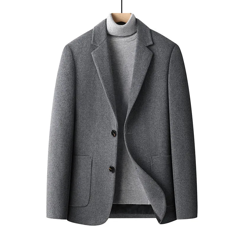 Men's slim fit wool suit jacket in grey, shown on a model, suitable for autumn casual wear.