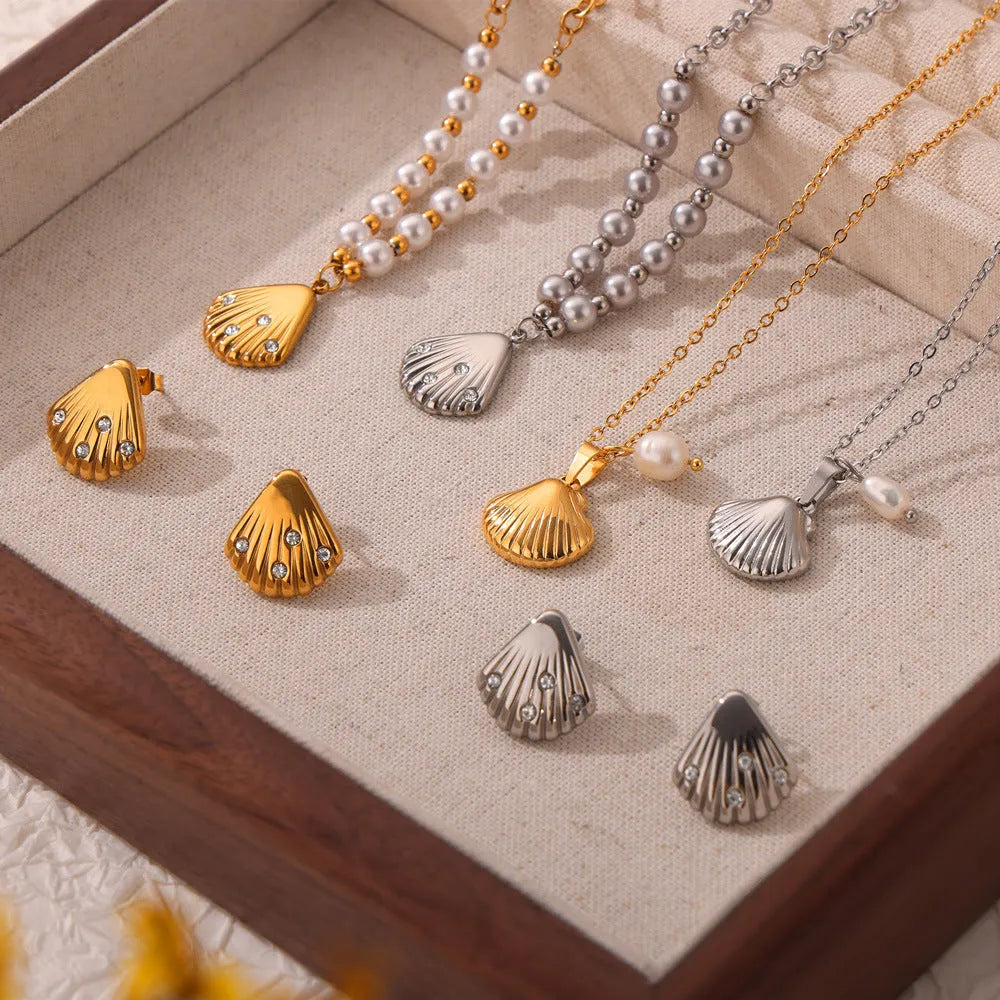 Gold titanium steel necklace with French vintage shell pendant and freshwater pearl beads on O-shaped chain