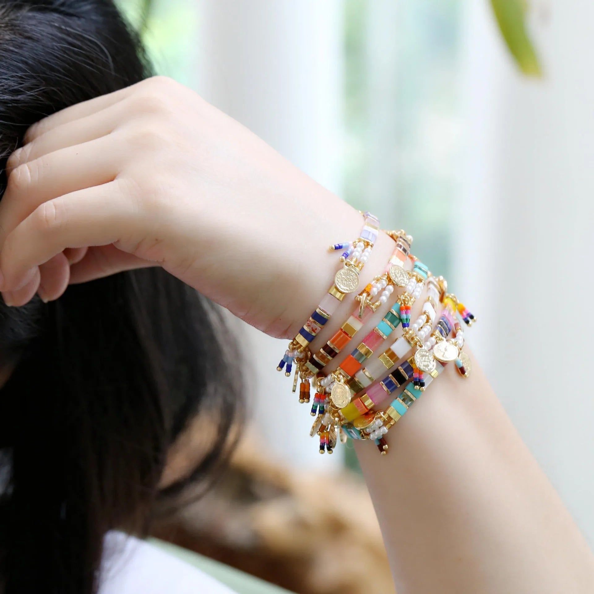 Women's handmade bracelet with imitation pearls and glass coloured beads in six colour options
