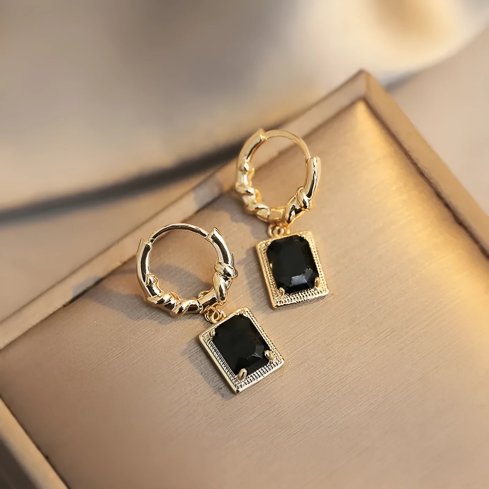 Geometric quadrilateral copper earrings with black zircon detail in French court retro style