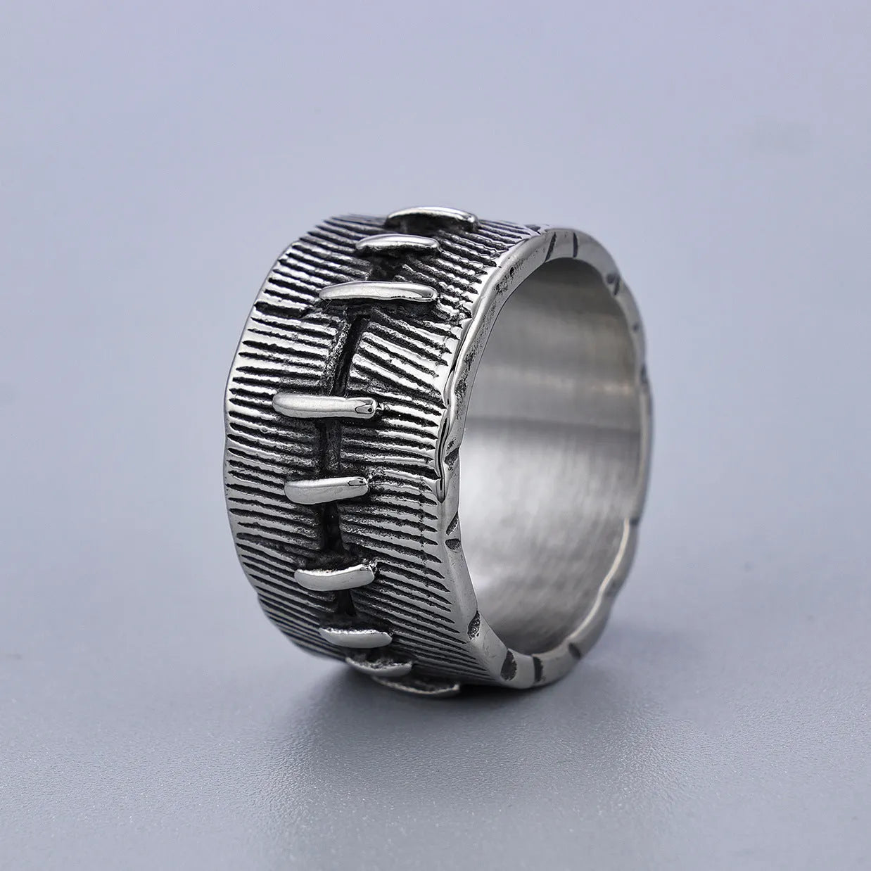 Titanium steel dark punk stitched ring with geometric U-shaped design, retro colour finish