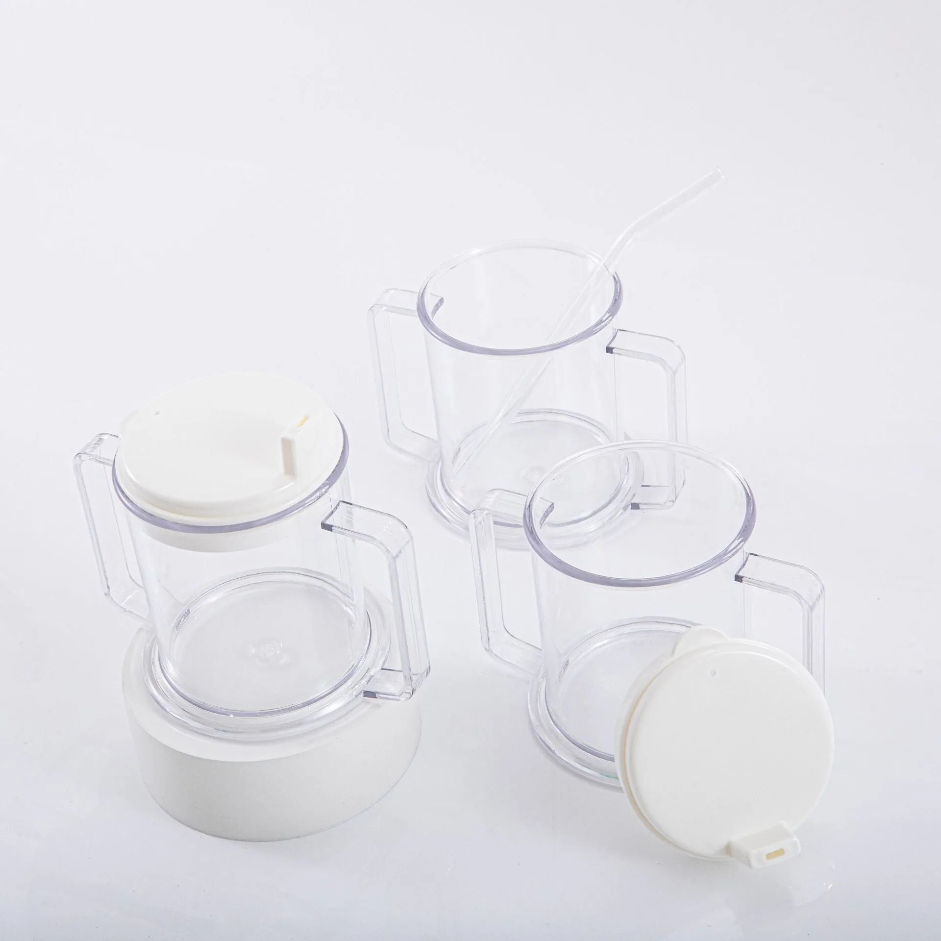 Transparent plastic spill-proof drinking cup showing 14cm height and 12cm brim.