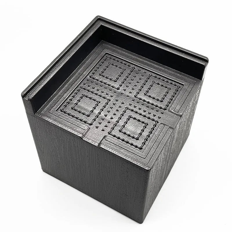 Four black thickened plastic bed foot mats for raising sofa and furniture height.