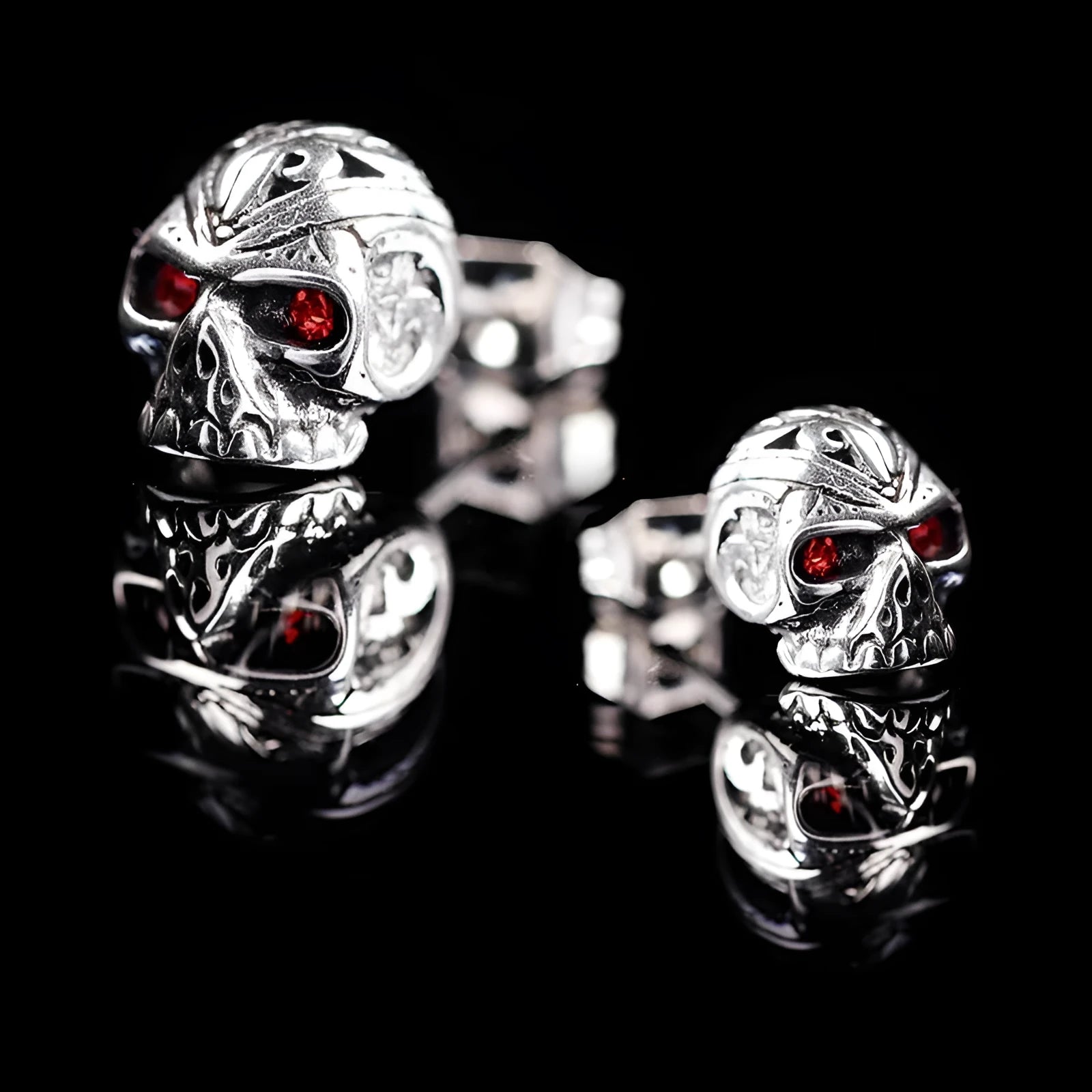 Retro red eye ghost head skull stud earrings with electroplated finish and alloy inlay detailing