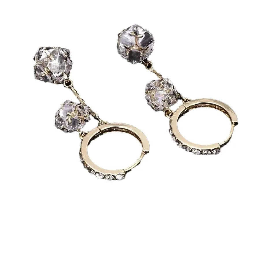 Silver copper earrings with tassel ball and rhinestone ball design in drop shape