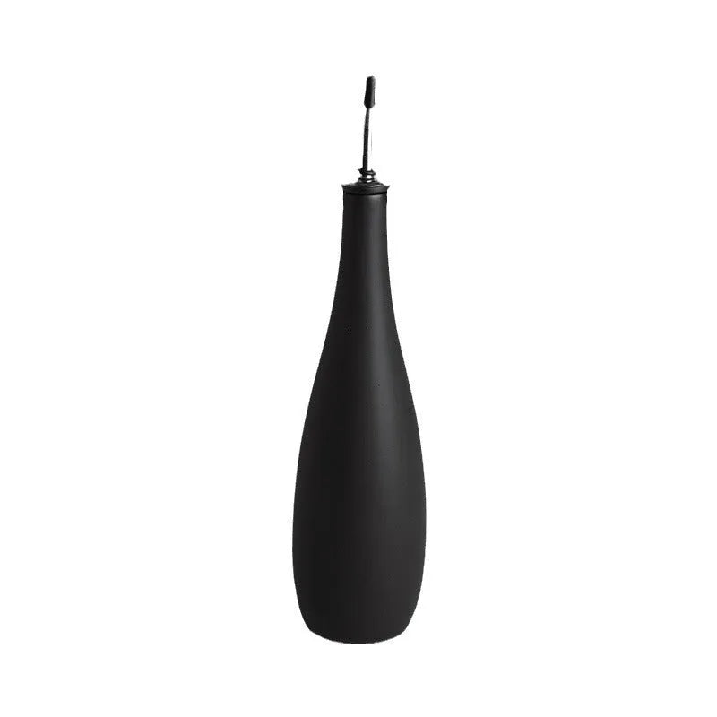 Ceramic oil pot with integrated funnel in black, coffee or white colour with 650ml capacity