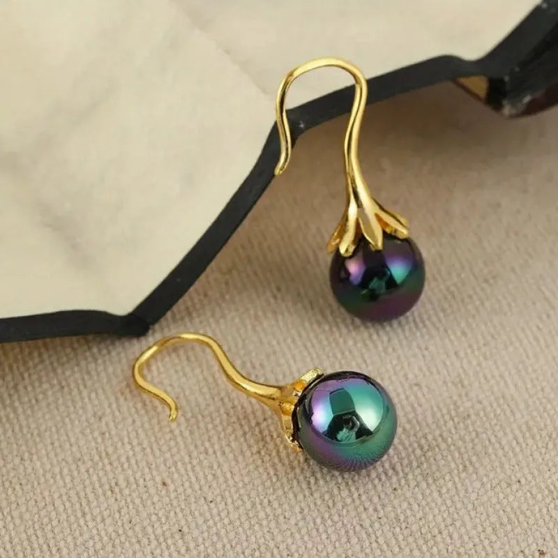 Women's alloy electroplated imitation gold colour retro fashion earrings with personalised creative design