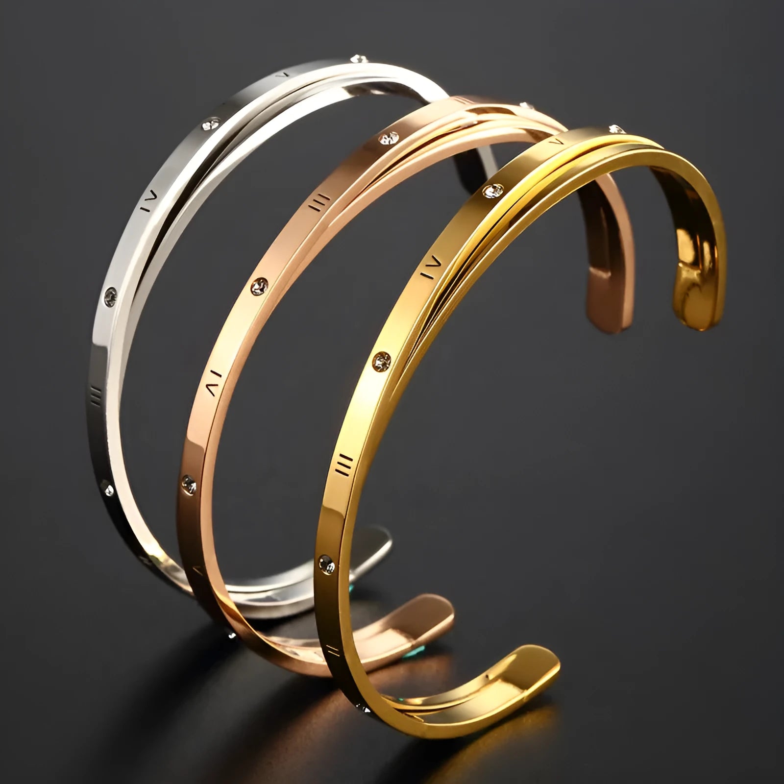 Open-ended stainless steel women's bracelet with inlaid zircon stones and love heart design in electroplated rose gold finish