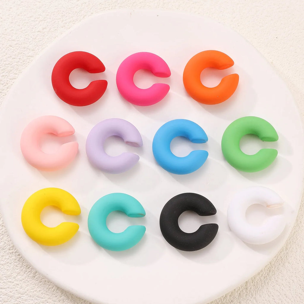 Geometric C-shape matte clip-on earrings for women in multiple candy colours with non-piercing design