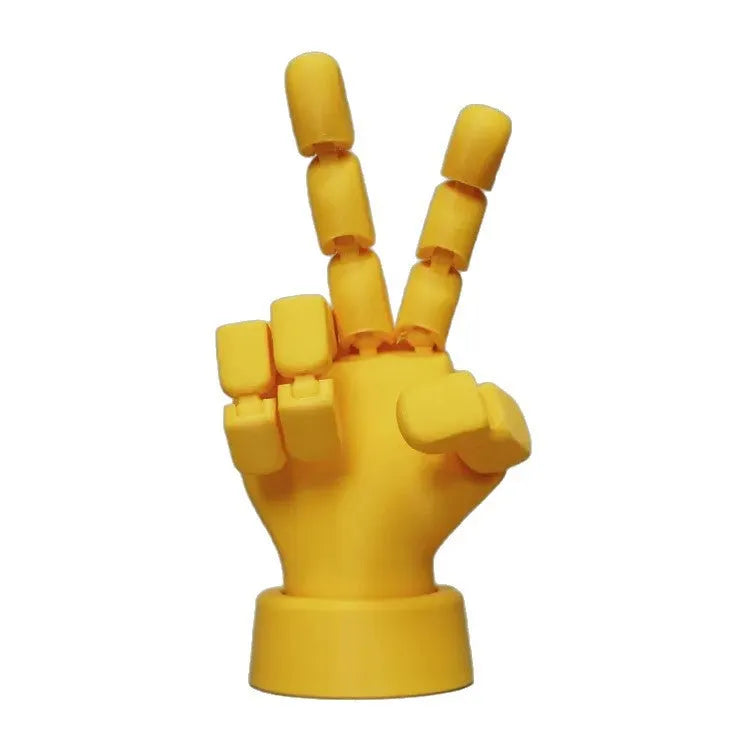 Yellow PLA movable joint hand prop for animation and photography measuring 5x5.38x7.5 cm