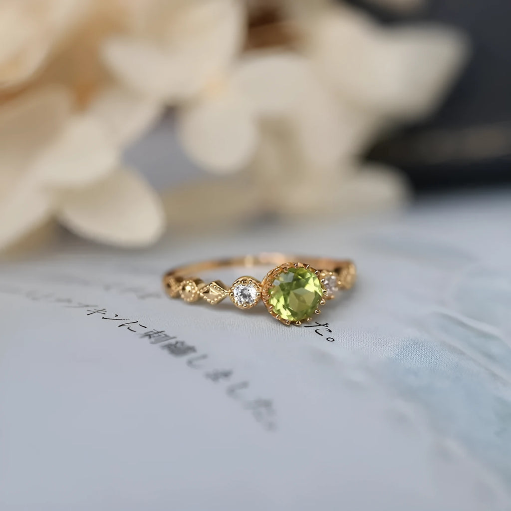 Japanese style copper ring with quadrilateral geometric design and imitation peridot centrepiece