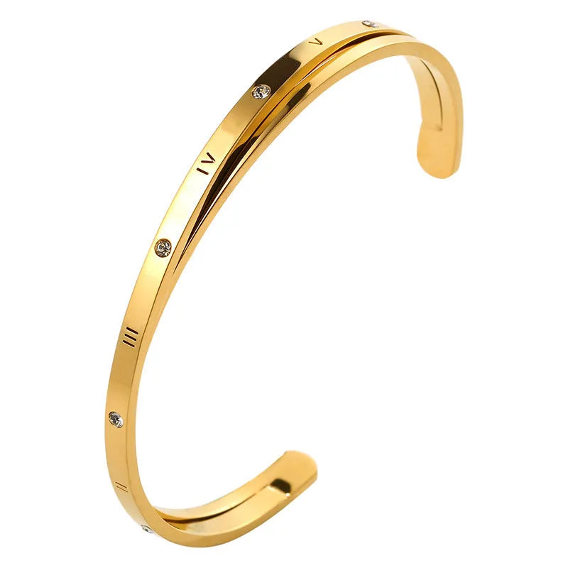 Open-ended stainless steel women's bracelet with inlaid zircon stones and love heart design in electroplated rose gold finish