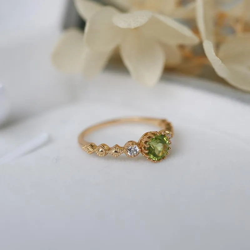 Japanese style copper ring with quadrilateral geometric design and imitation peridot centrepiece