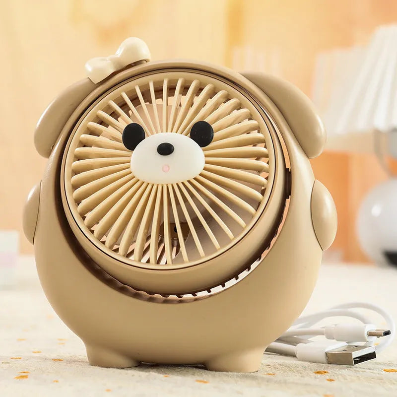 Cute dog-themed USB desktop fan in choice of puppy and bear colours on a desk