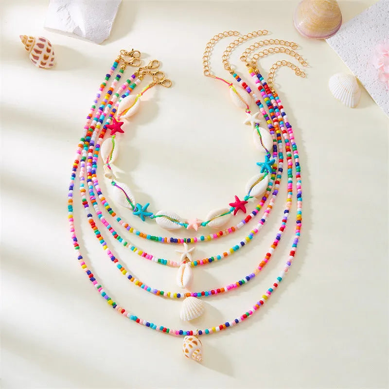 Five-layer starfish shell bead necklace with conch pendant in blue and multicolour options