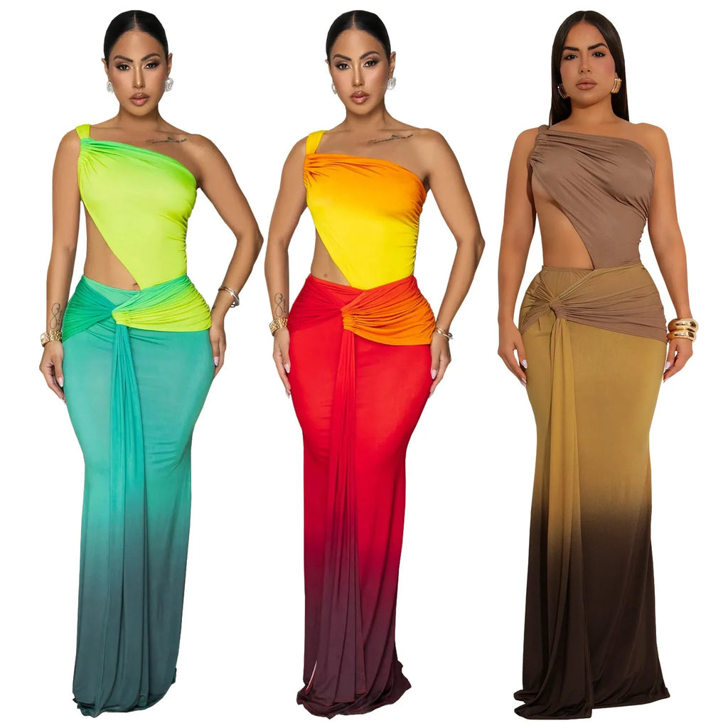 A woman wearing a long gradient colour dress with a cross-shoulder sleeveless design and a high waist.