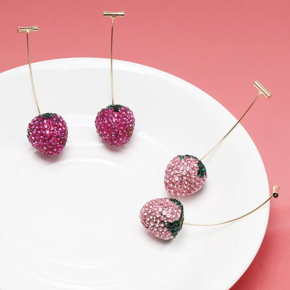 Geometric strawberry design earrings with spot drill detailing in red zinc alloy