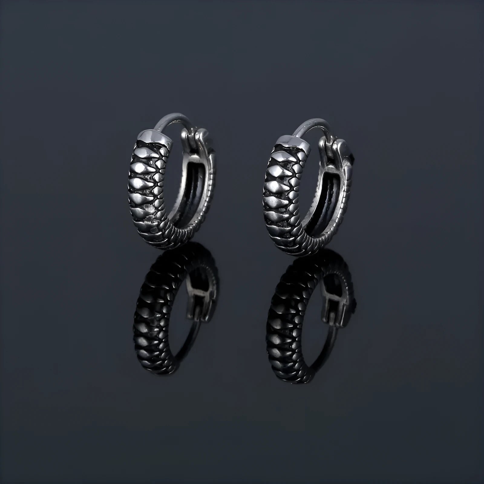 Silver titanium steel retro earrings with a geometric twist and striped design.