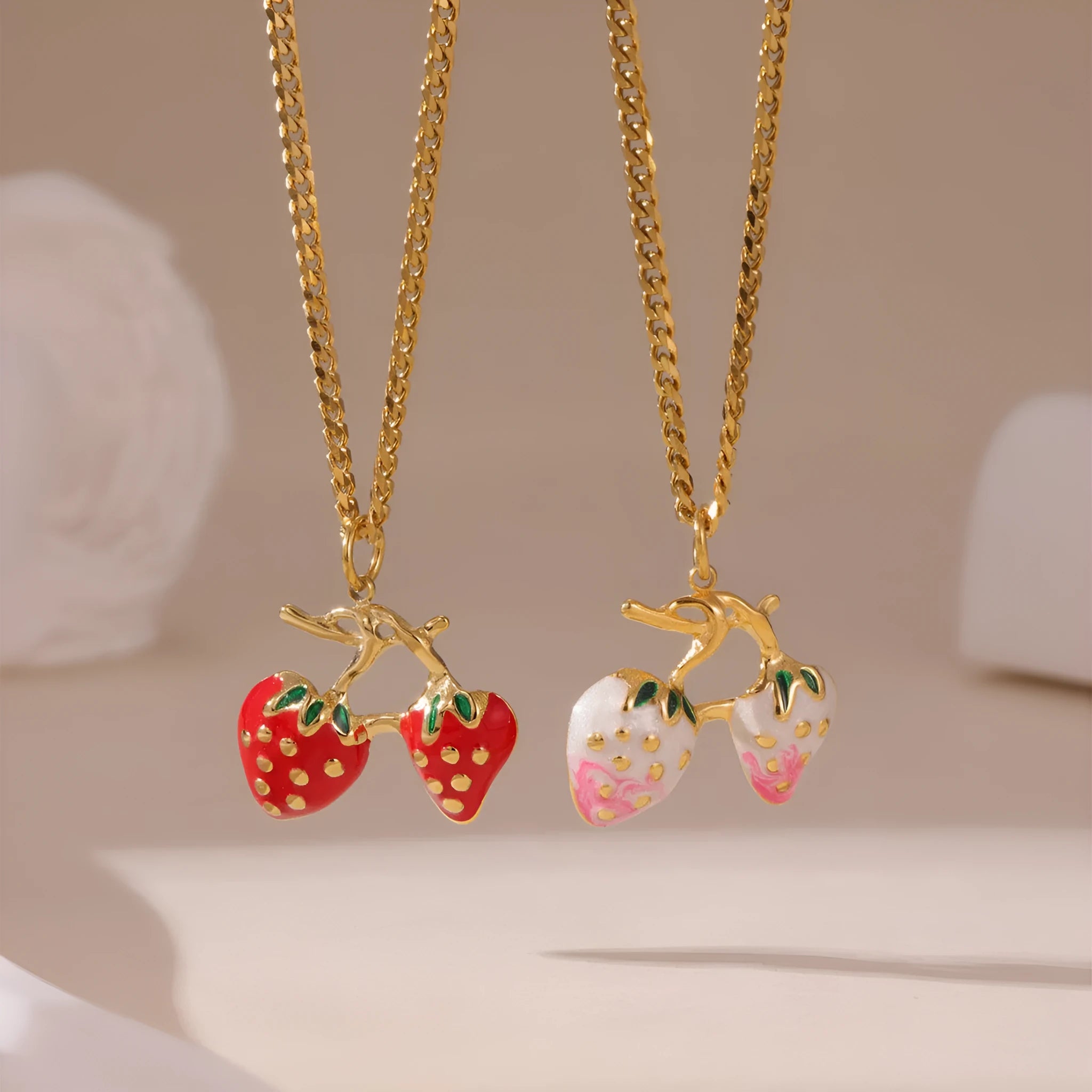 Stainless steel necklace with a strawberry fruit pendant in red or white gradient colour