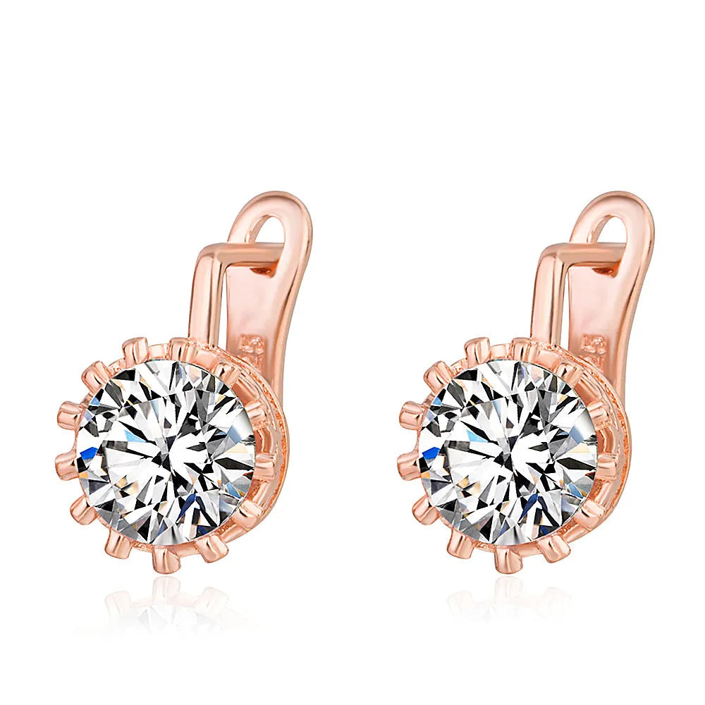 Korean retro style crown ear clip earrings for women in rose gold and white gold colour finishes.