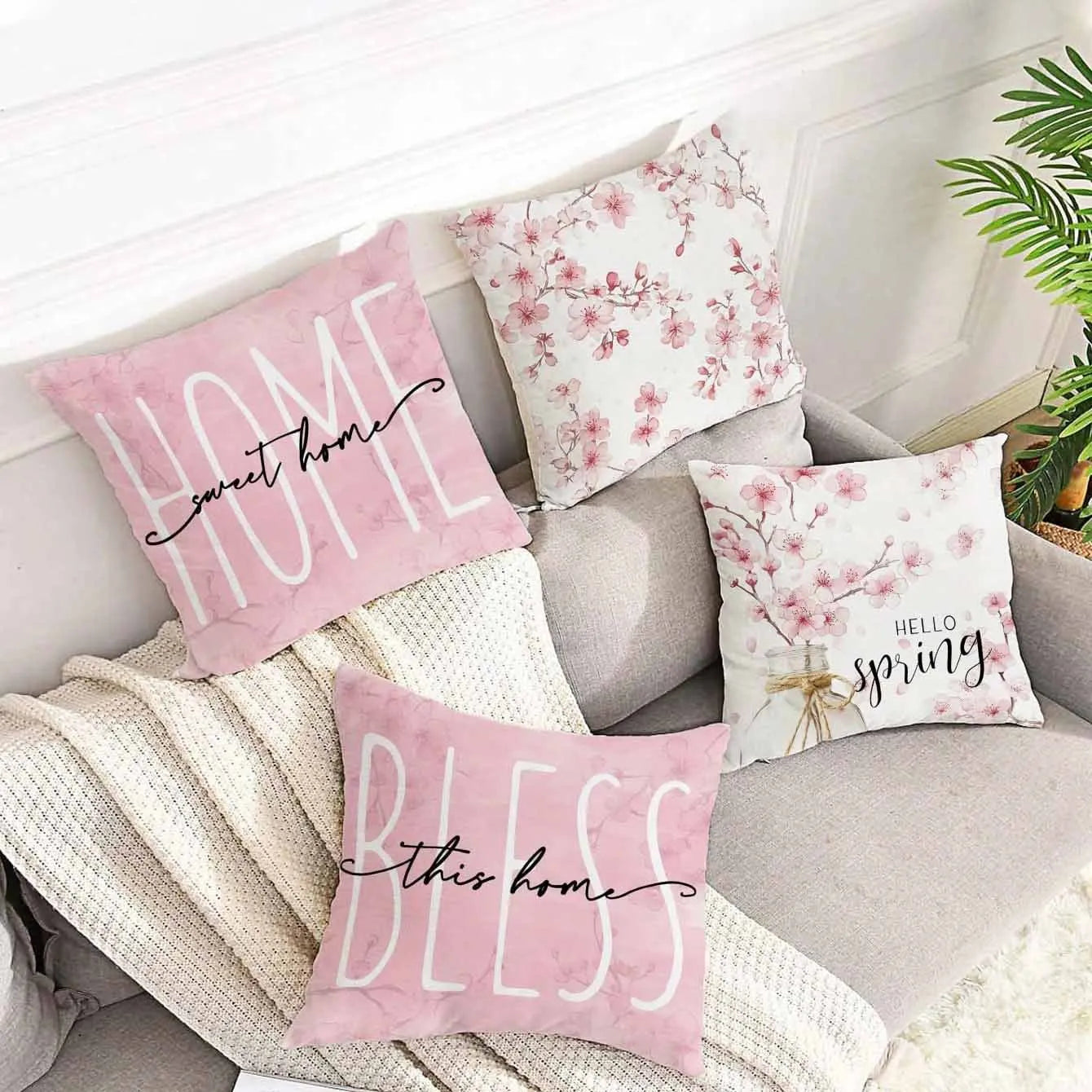 Square short velvet cushion cover with cherry blossom letter print, 45cm size, shown in one of four colour options.