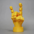 Yellow PLA movable joint hand prop for animation and photography measuring 5x5.38x7.5 cm