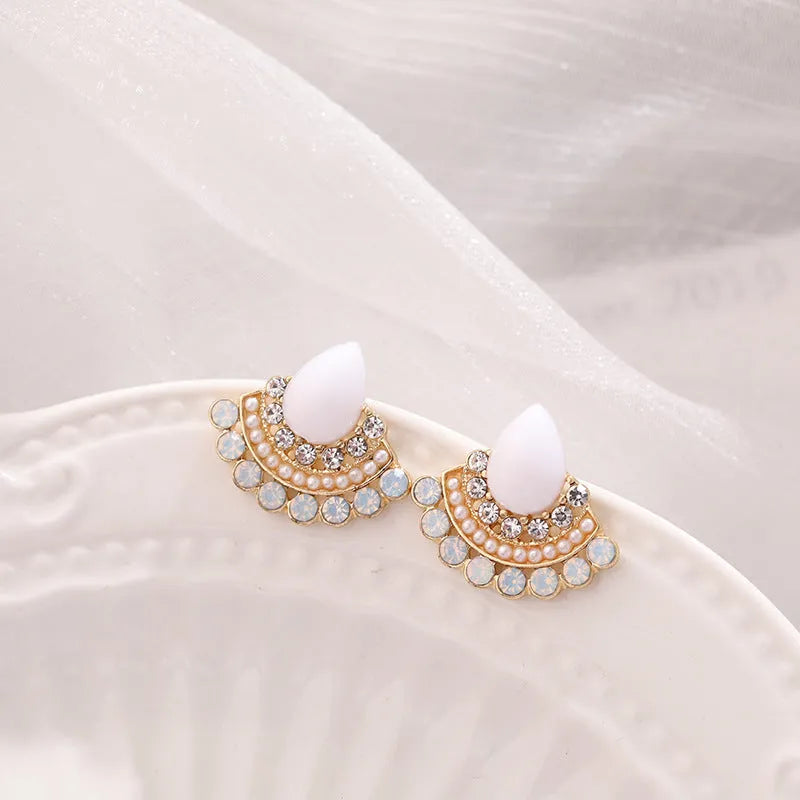 Women's retro fan-shaped needle earrings with sterling silver electroplating and rhinestone accents