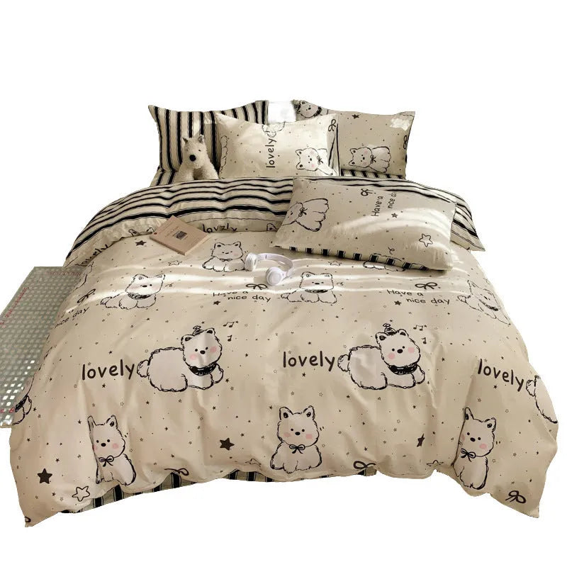 Cartoon dog print pure cotton bedding four-piece set shown on a bed