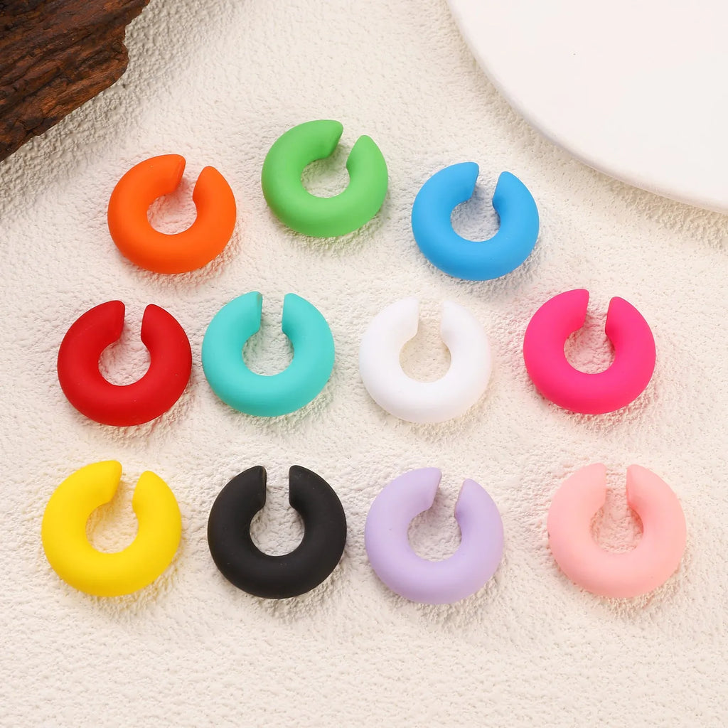 Geometric C-shape matte clip-on earrings for women in multiple candy colours with non-piercing design