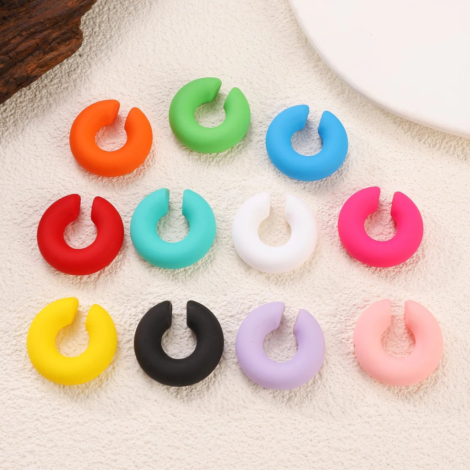 Geometric C-shape matte clip-on earrings for women in multiple candy colours with non-piercing design