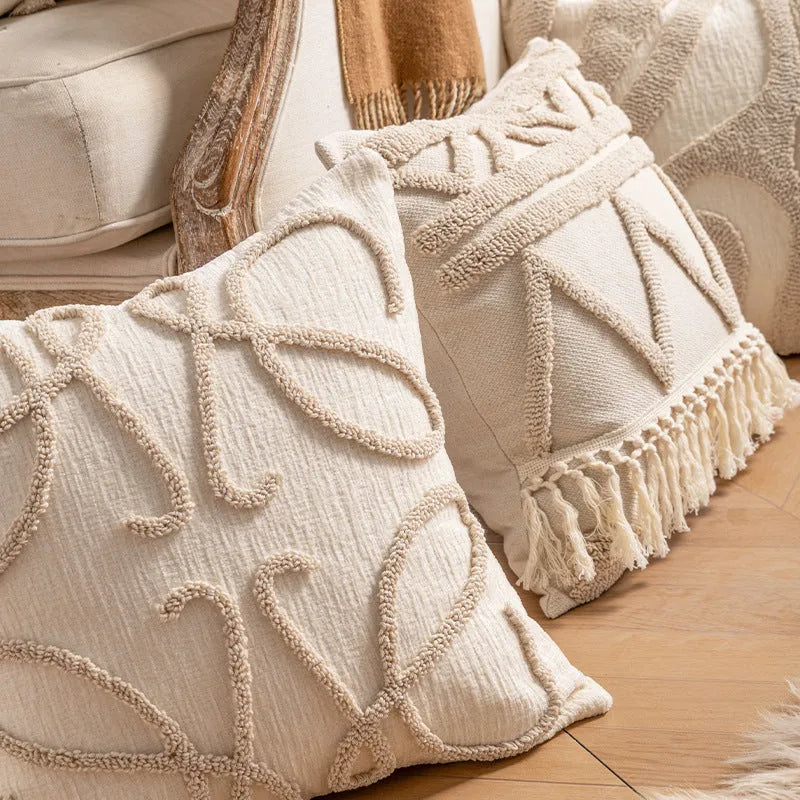 Decorative cushion cover with knitted tassel trim in spiral dots pattern, 45x45cm size.