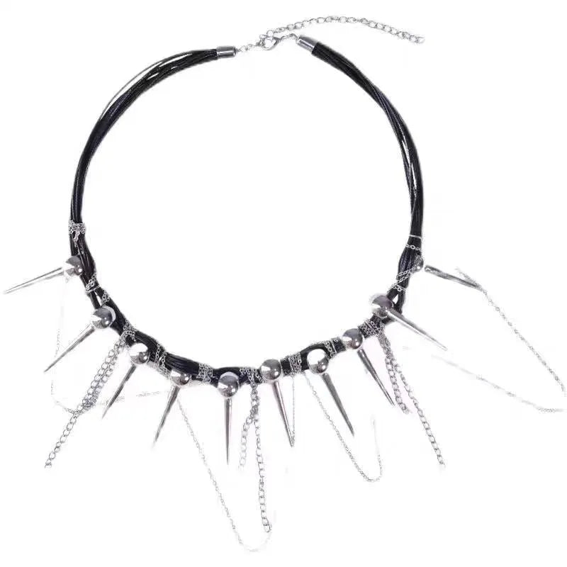 Leather necklace with round beads and winding tassel featuring rivet details in picture colour