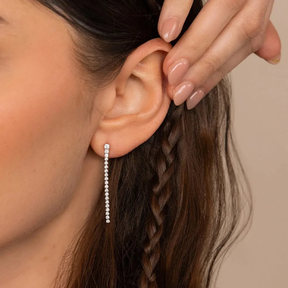 Geometric stainless steel zircon stud earrings with linear detailing in gold and steel tone options