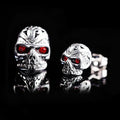 Retro red eye ghost head skull stud earrings with electroplated finish and alloy inlay detailing