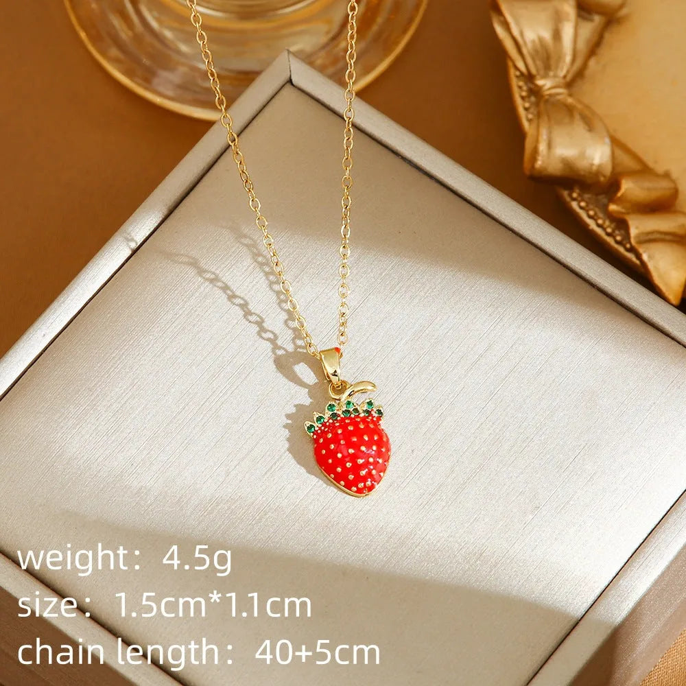 Titanium steel women's necklace with O-ring chain and delicate indie fruit pendant in golden colour options