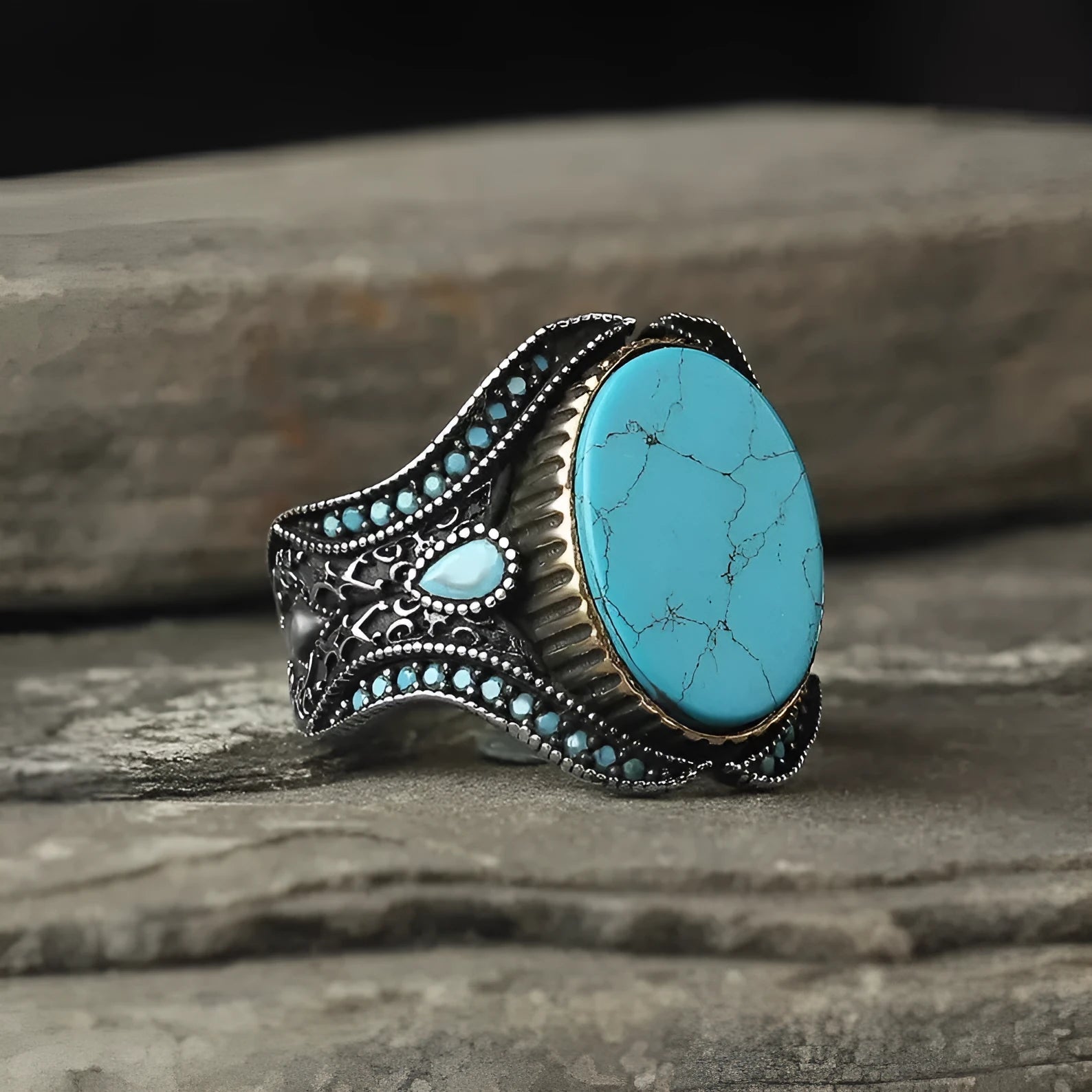 Men's antique silver alloy ring with a round band and a central turquoise-coloured stone.