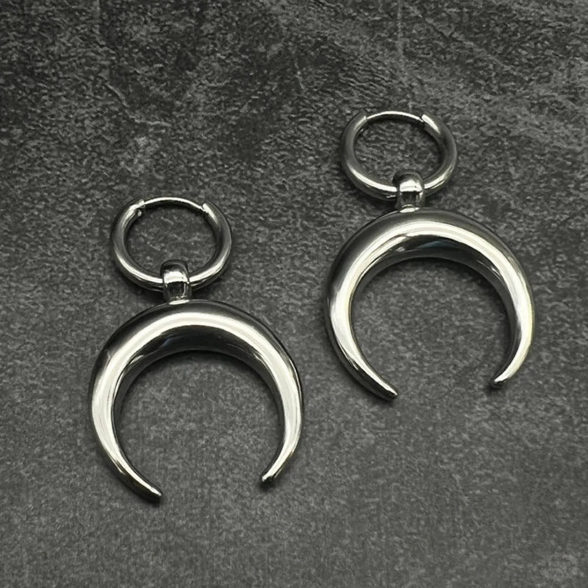 Silver vintage gothic moon big hoop earrings with geometric design and ear clip fastening