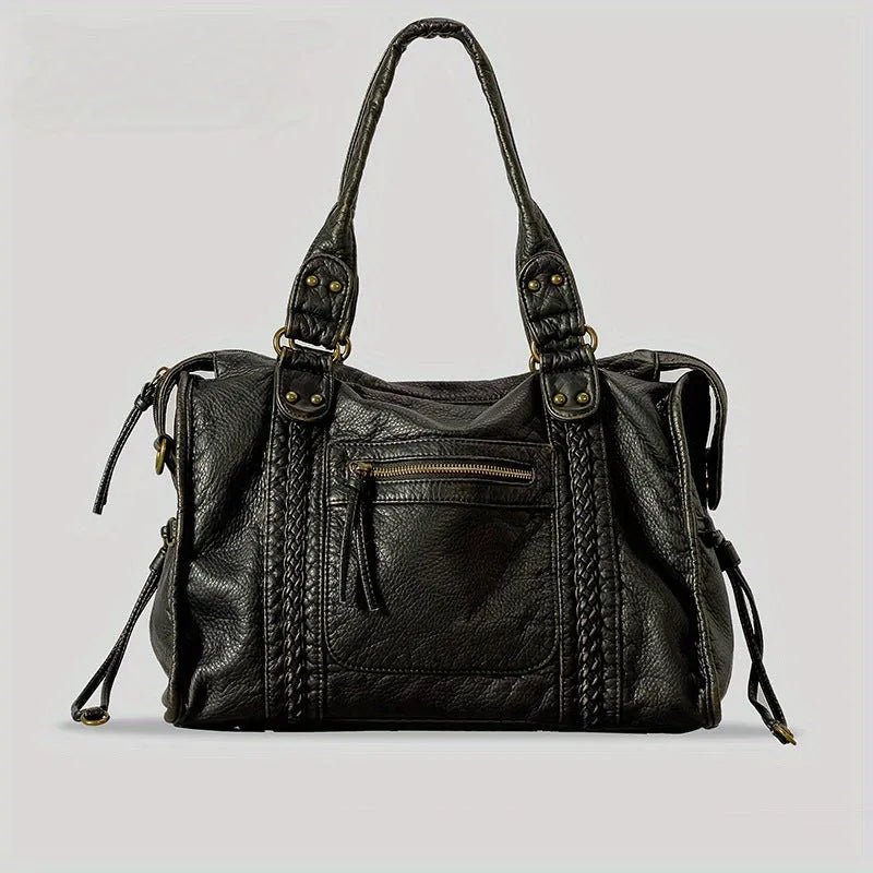 Women's brown retro shoulder messenger bag made of soft PU, showing weaving detail and a single strap.